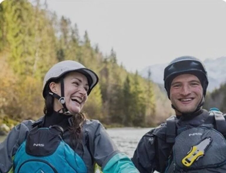 Paddler wearing protective kayaking clothing on the water